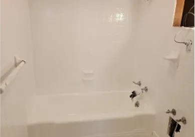 Floor tiles before reglazing with faded and uneven color