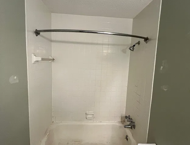 Before comparison of sink reglazing showing flawless transformation
